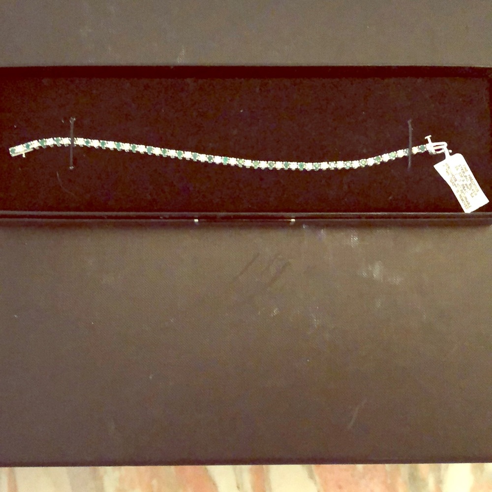 White sapphire and emerald tennis bracelet